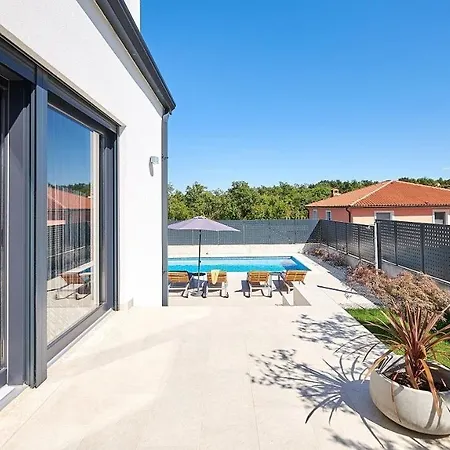 Elegant Dolcea With A Swimming Pool Πανσιόν